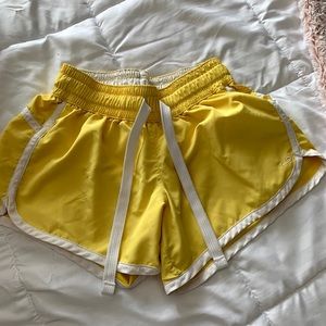 Champion yellow running shorts